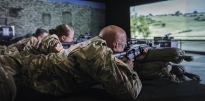 Soldiers conducting weapons simulator training 
