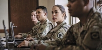 Soldiers sitting in a classroom